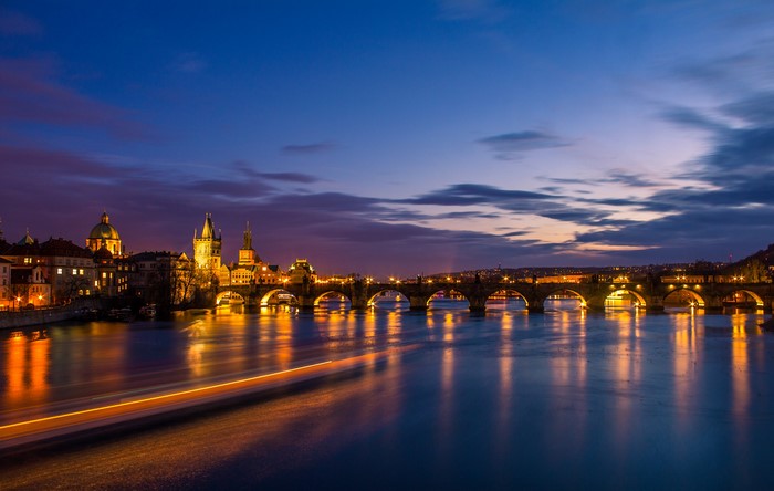 Charles Bridge over Vltava River in Prague at Dusk