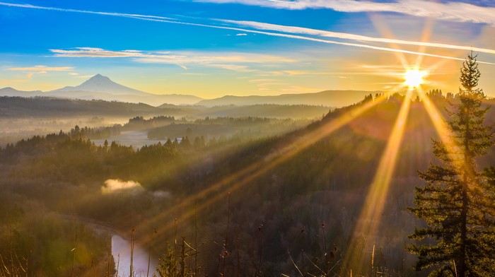Sunrise over misty valley with Mount Hood, Oregon
