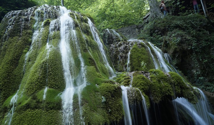 Bigar Waterfall in Romania covered in moss
