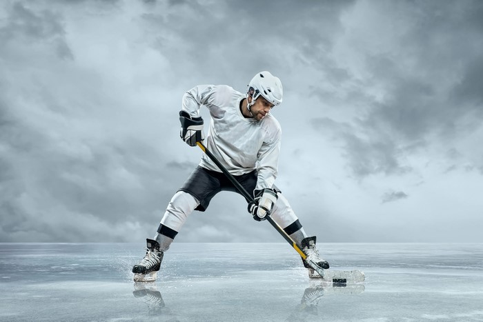 Man in Hockey Uniform Playing Hockey