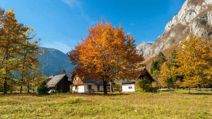 Autumn in Bohinj, Slovenia with Mountains and Houses
