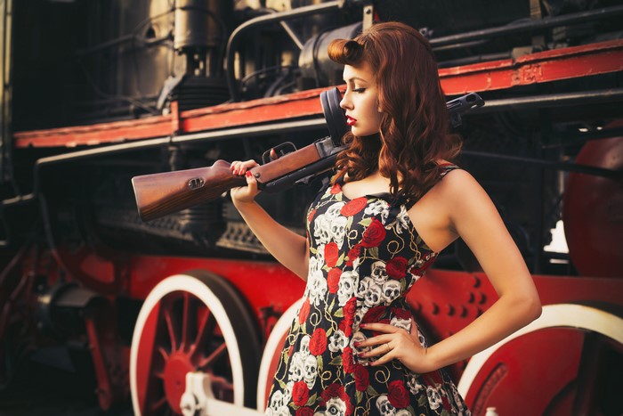 Woman with Assault Rifle and Train