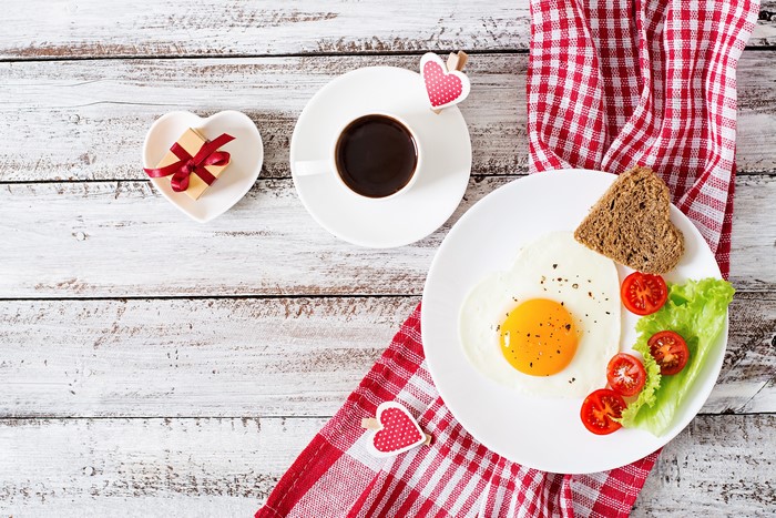 Valentine's Day Breakfast with Heart-Shaped Fried Egg and Coffee