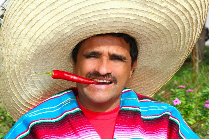 Man in Sombrero with Chili Pepper