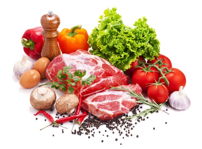 Meat, Vegetables, and Spices on White Background