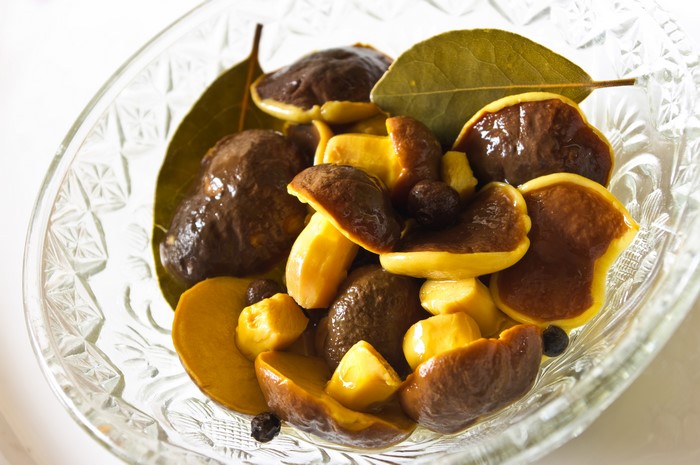 Pickled Mushrooms in a Glass Bowl