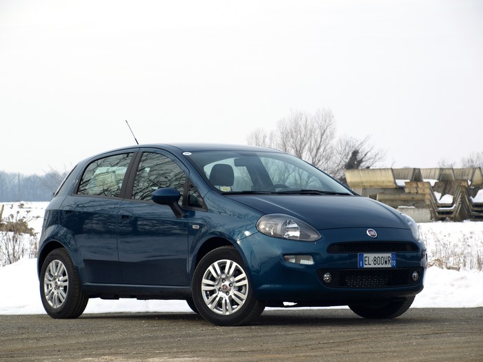 Blue Fiat Punto 5-door in winter landscape