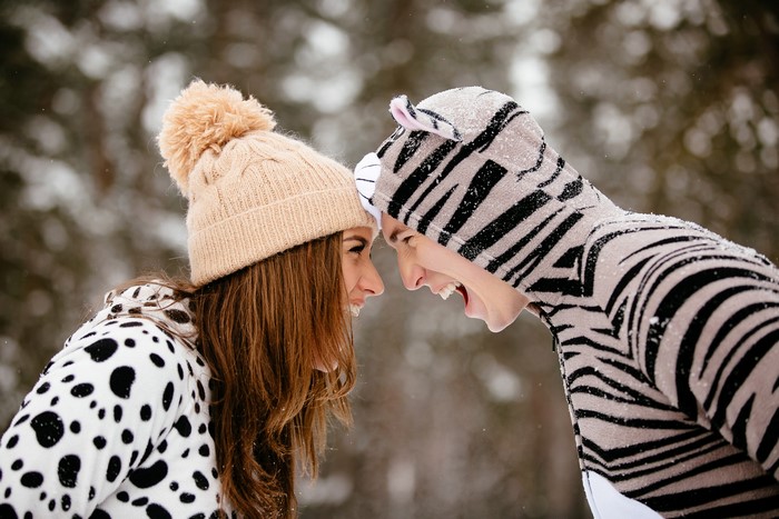 Couple in animal costumes in the snow