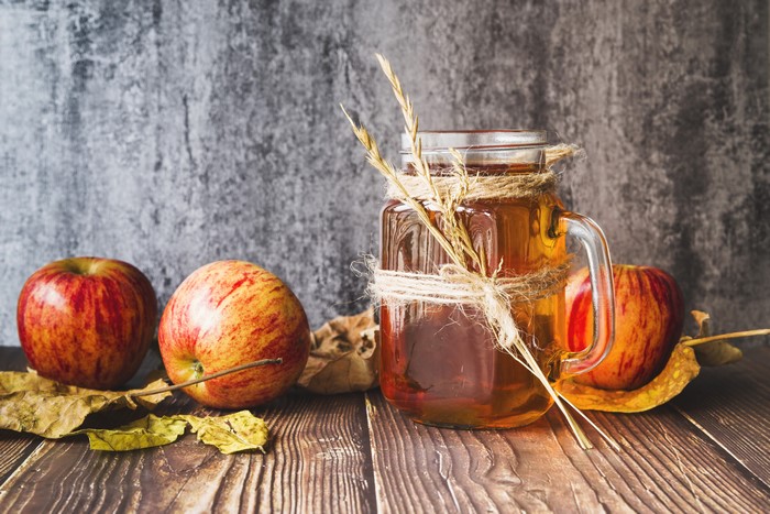 Apples and Apple Juice in a Jar