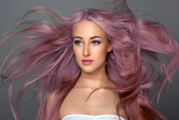 Woman with flowing pink hair