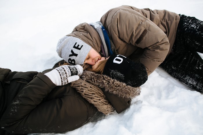 Couple kissing in the snow