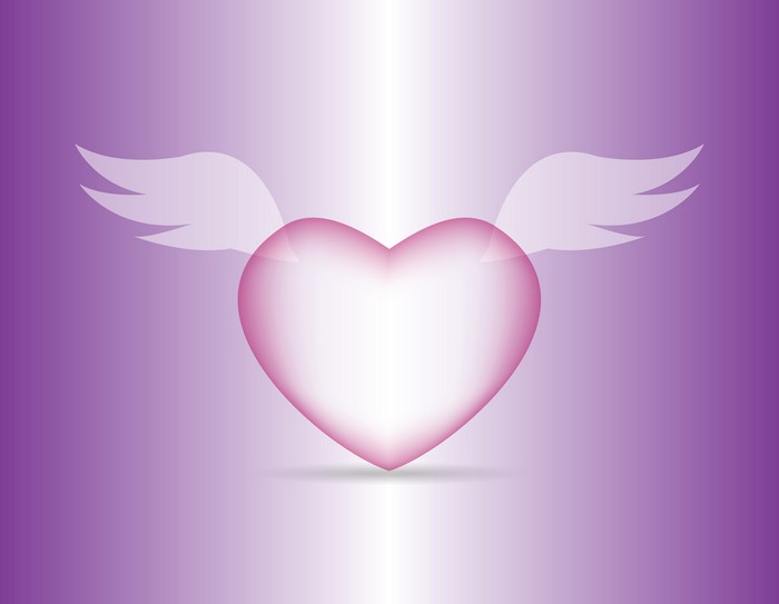 Pink heart with wings on a purple background