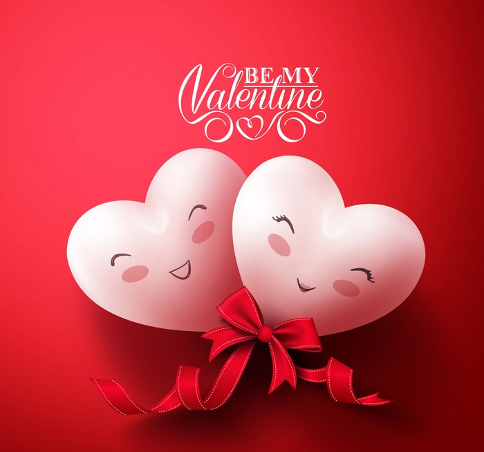 Two hearts with faces and a red bow