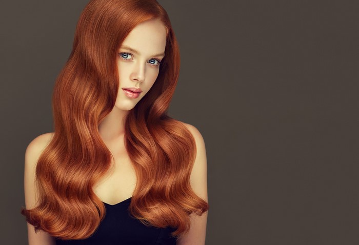 Redhead woman with wavy hair