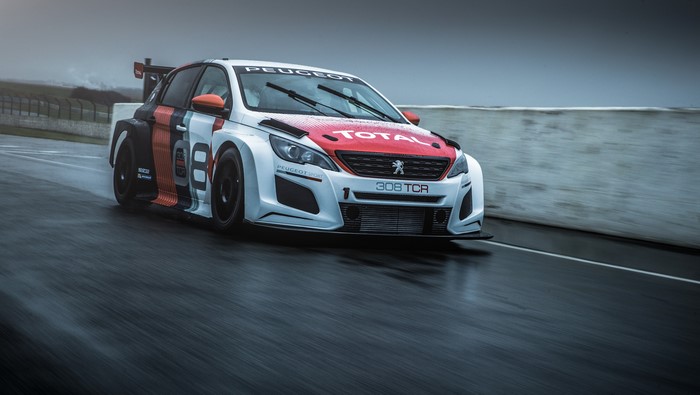 Peugeot 308 TCR race car on a wet track
