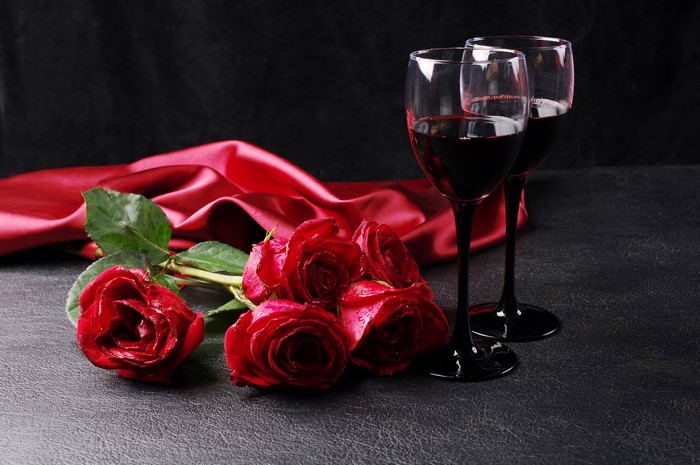 Red Roses and Wine Glasses with Red Silk