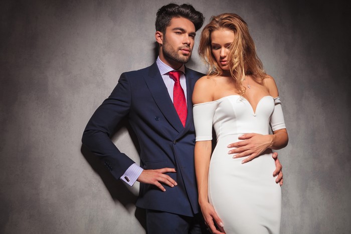 Man in Suit with Woman in White Dress