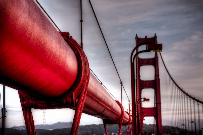 Red pipe and tower of Golden Gate Bridge