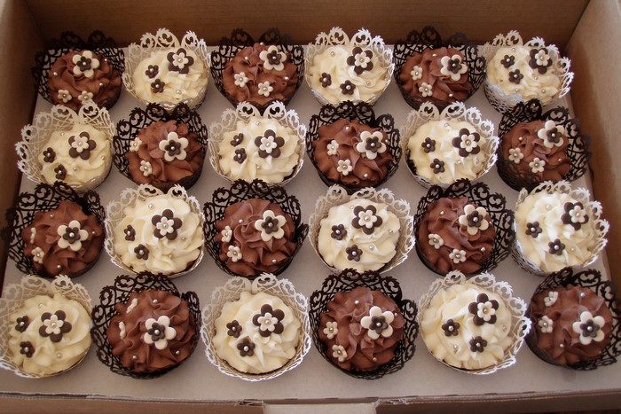 Box of Chocolate and Vanilla Cupcakes with Flower Decorations
