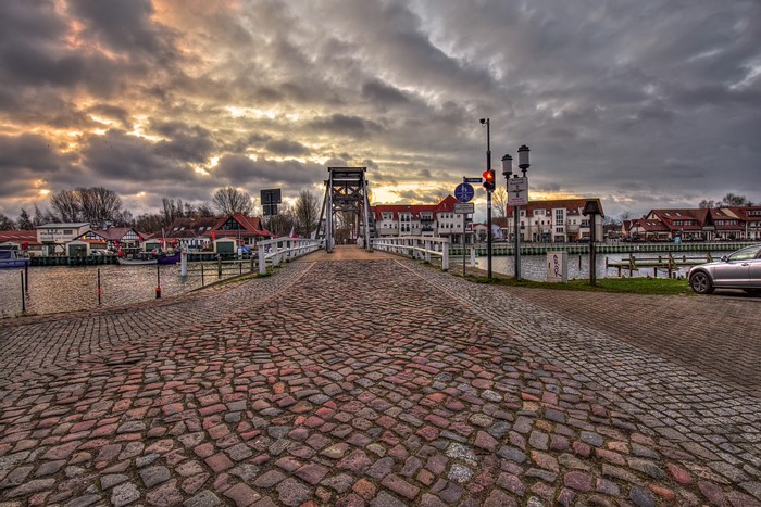 Bridge over a river in Greifswald, Germany at dusk