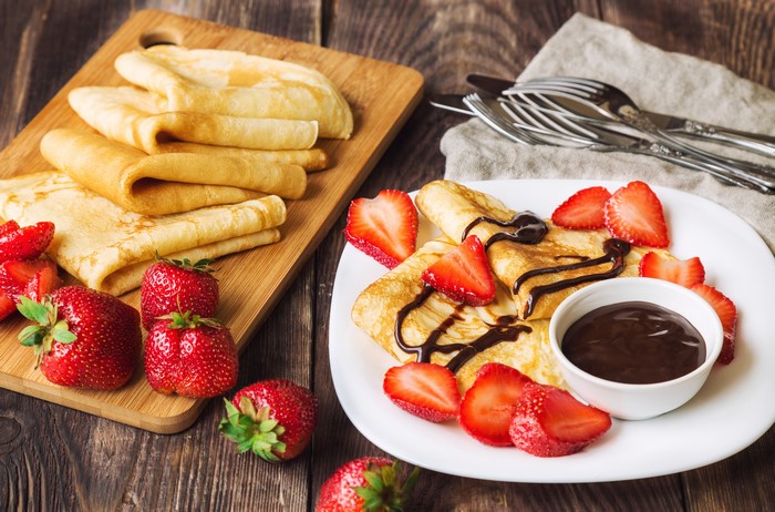 Pancakes with Strawberries and Chocolate Sauce