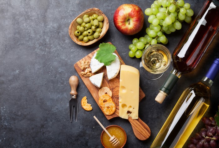 Wine, Cheese, Grapes, Apple, Olives, and Stemware