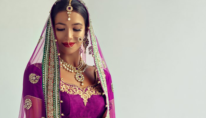 Indian Bride in Purple Lehenga with Jewelry