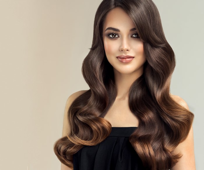 Brown Haired Woman with Wavy Hair