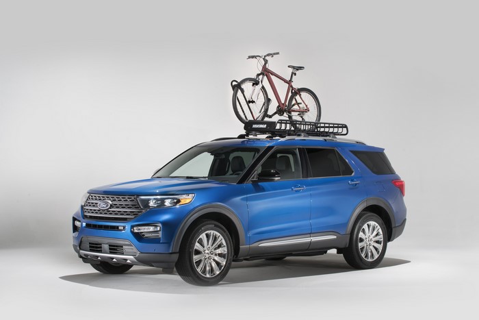 Blue Ford Explorer with Bike Rack and Bicycle