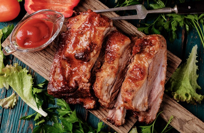 4K BBQ Ribs with Ketchup on Cutting Board