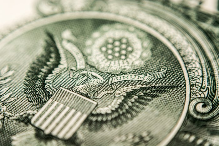 Macro shot of the Great Seal of the United States on a dollar bill