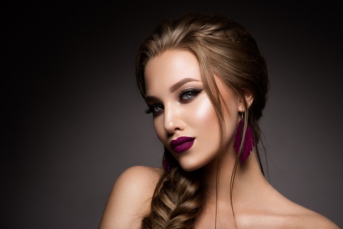 4K Portrait of Woman with Braid and Bold Makeup