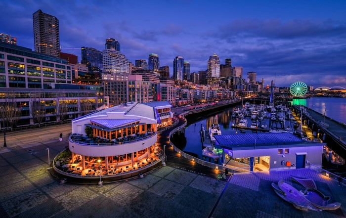 Seattle waterfront at dusk with Ferris wheel