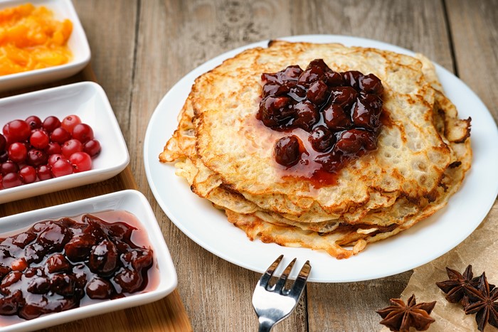 Pancakes with berry jam and cranberries