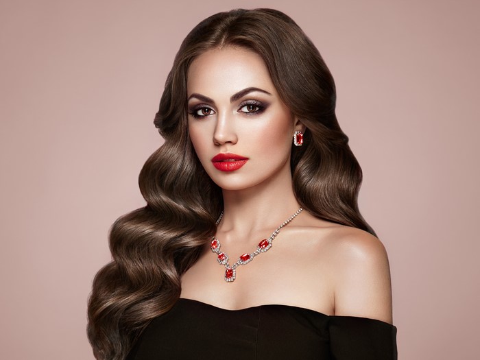 Woman with Red Lips and Jewelry
