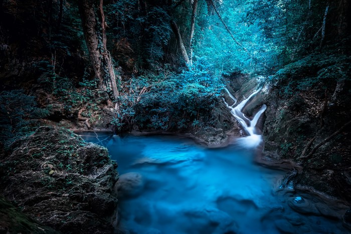 Waterfall in a tropical forest in Kanchanaburi, Thailand