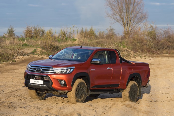 Orange Toyota Hilux Pickup Truck Off-Road