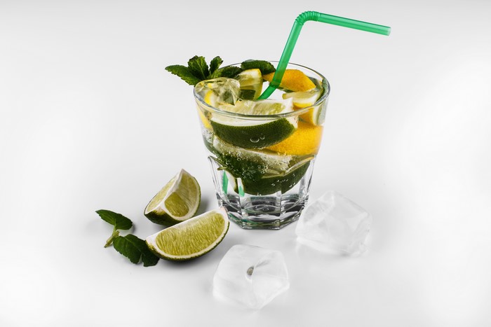Mojito cocktail with lime, mint, and ice