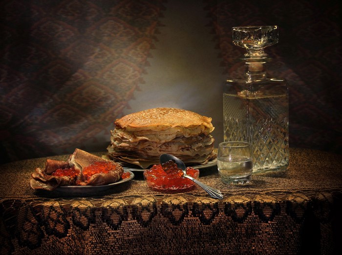 Pancakes with caviar and vodka