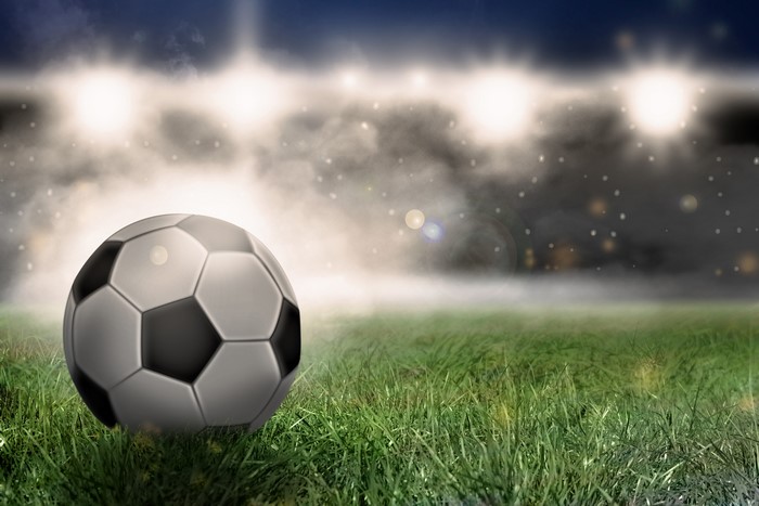 4K Football on Grass Field