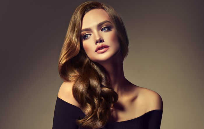 Brown haired woman with blue eyes