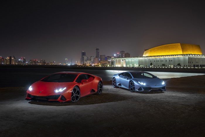 Two Lamborghini Huracan EVO cars at night