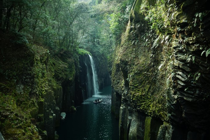 Takachiho Gorge waterfall with boat in Japan