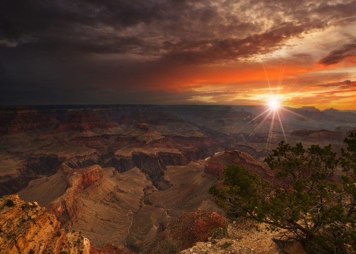 Grand Canyon National Park at sunset with sun rays