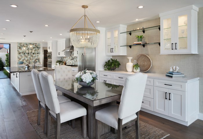 Dining Room with Kitchen View and Chandelier