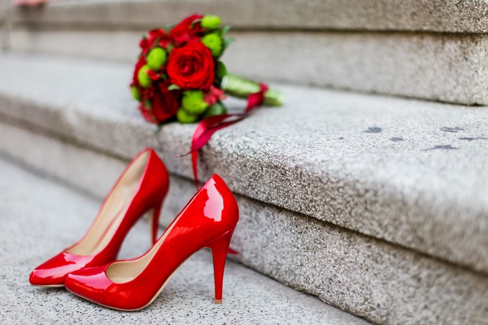 Red Stilettos and Bridal Bouquet on Stairs