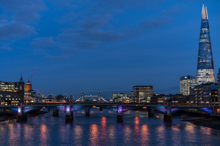 London skyline with bridges and The Shard at dusk