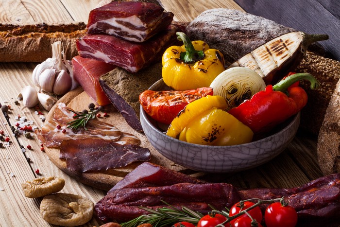 Assortment of Cured Meats, Grilled Vegetables, and Bread