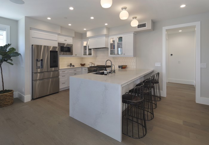 Modern Kitchen with Island and Stainless Steel Appliances