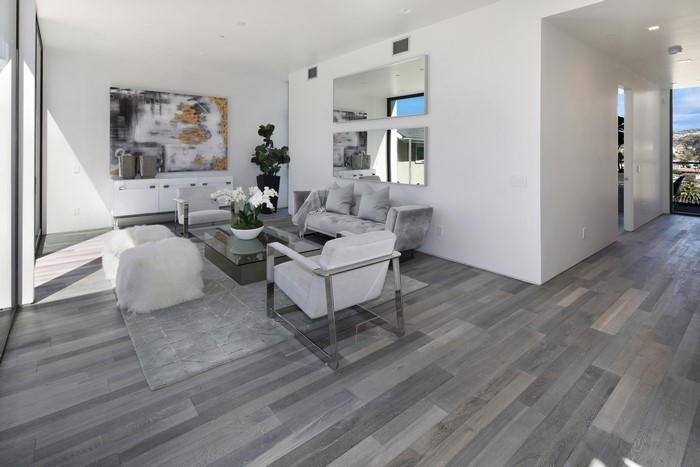 Modern Living Room with Abstract Art and Mirrors